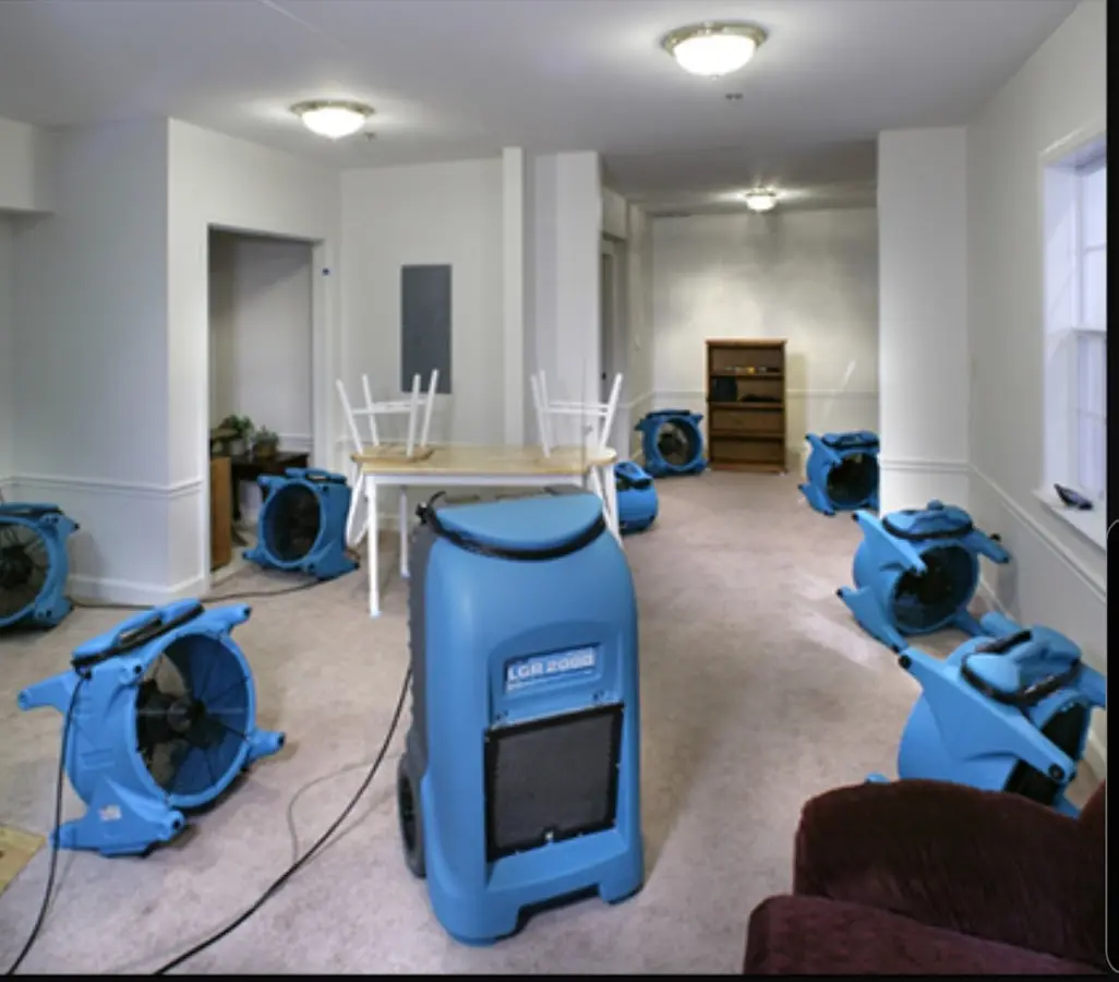 Air movers and dehumidifier setup for Water Damage Restoration in Gustine